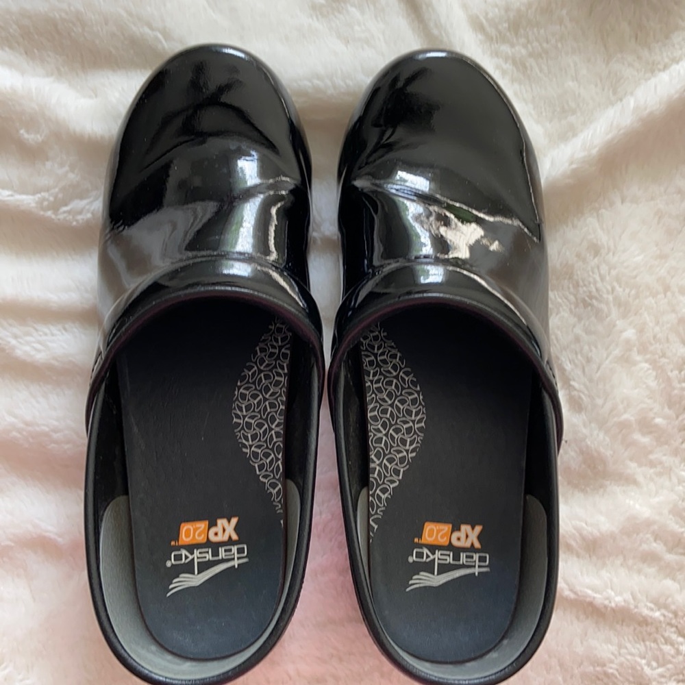 Dansko Black Patent Slip-On Clogs